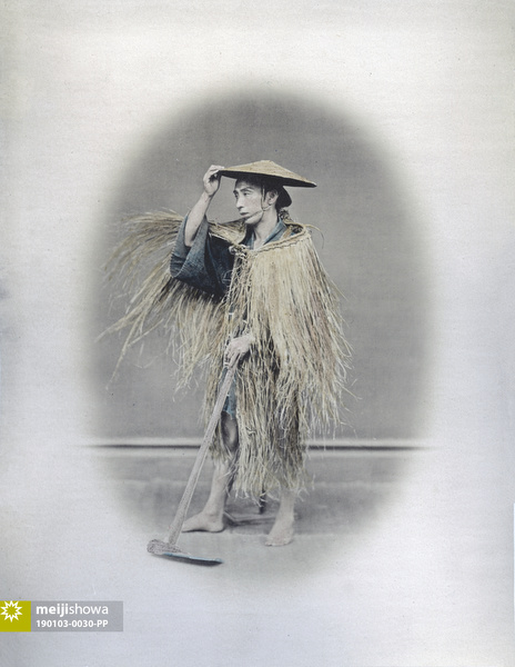 190103-0030-PP - Farmer in Straw Raincoat
